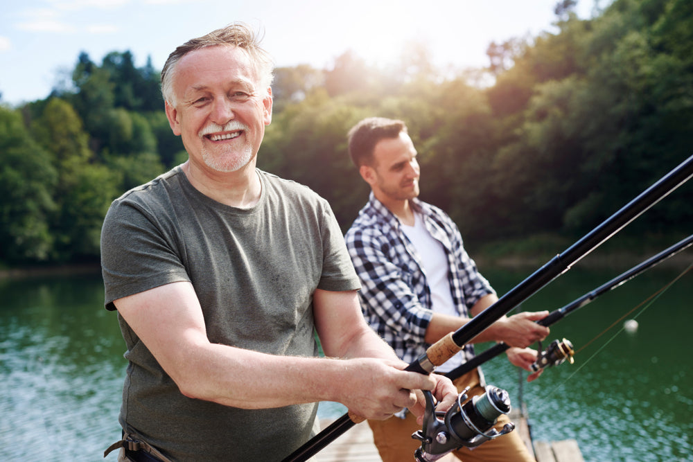 Portrait of cheerful senior man fishing  - 5 Creative Ways to Use a Fishing Wagon Cart Beyond Fishing