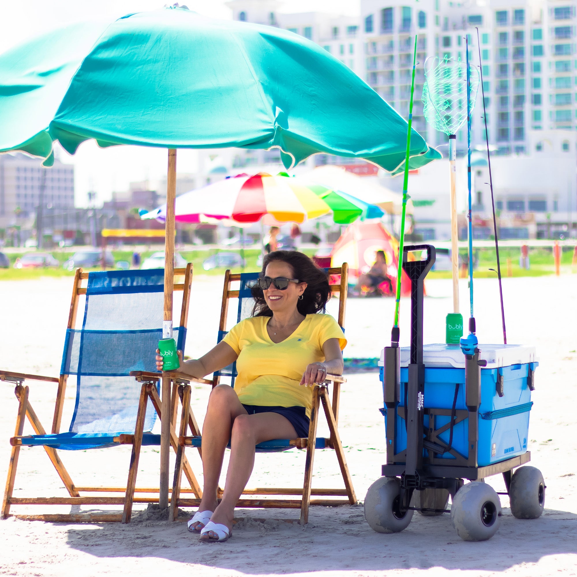 beach cooler and fishing cart on the beach 